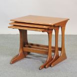 A nest of three 1970's hardwood occasional tables, 55cm,