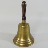 A large brass school bell,