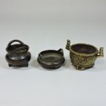 A Chinese bronze miniature censer, 8cm wide, together with two other smaller censers,