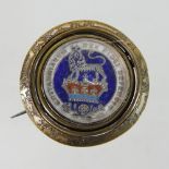 A George IV Britannia Defence badge, dated 1825, of swivel design, within a gilt frame,