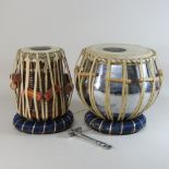 A Tabla drum, 30cm high, together with another,