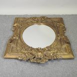 A large gilt over mantel mirror,