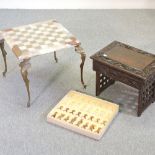 An onyx chess table and matching chess set, boxed,