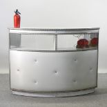 A 1960's white padded vinyl bar, with a melamine top,