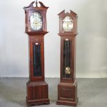 A reproduction longcase clock, with Westminster chimes, 180cm high,