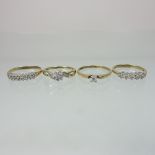 A collection of four various 9 carat gold and diamond set ladies rings (4)