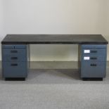 A mid 20th century industrial painted metal pedestal desk,