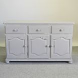 A grey painted sideboard,