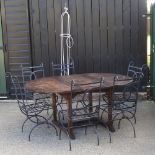 A teak extending garden table, 170 x 120cm,