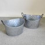 A large metal oval planter, 60cm,