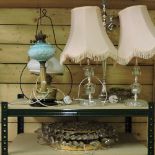 A collection of various lamps and chandeliers,