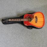 A Suzuki twelve string acoustic guitar,