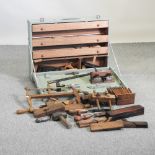 A carpenter's tool box, containing vintage tools,