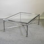 A chrome and glass top coffee table, 95 x 130cm, together with another,