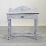 A 19th century and later blue painted 'Green Man' side table,