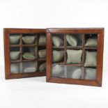 A pair of brown leather wristwatch display cases,