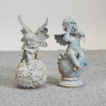 A painted metal model of a crying angel, 30cm high, together with a fairy,