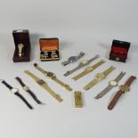 A collection of various wristwatches,