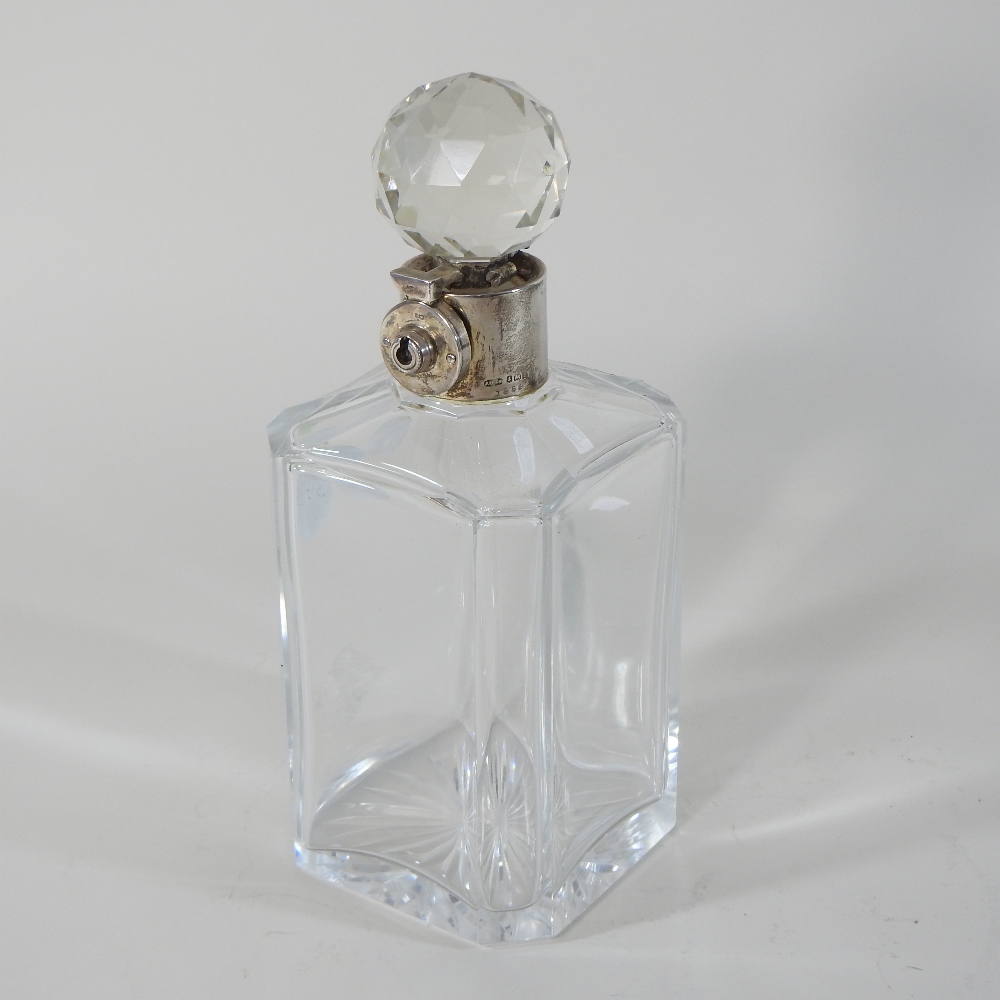 An early 20th century silver mounted glass decanter and stopper, with a lockable silver collar, - Image 6 of 7