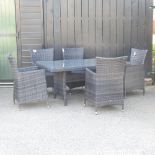 A rattan style garden table, 150 x 90cm,