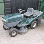 A Hayter green petrol driven ride-on lawnmower,