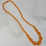 An amber style bead necklace,
