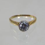 An 18 carat gold solitaire diamond ring, approximately 0.