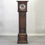 An early 20th century oak cased longcase clock,