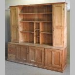 An unusually large 19th century stripped pine dresser,