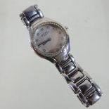 A Rotary steel cased ladies wristwatch, with a mother of pearl dial and gem set bezel,