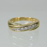 An 18 carat gold diamond half hoop eternity ring,