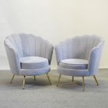 A pair of new grey upholstered shell shaped velvet upholstered armchairs