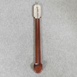 A reproduction mahogany stick barometer, bearing the maker's name,
