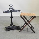 A black cast iron stick stand, 74cm high,