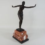 An Art Deco style bronze figure of a dancer, on a marble base,