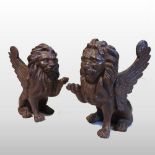 A pair of 19th century Venetian cast iron models of winged lions,