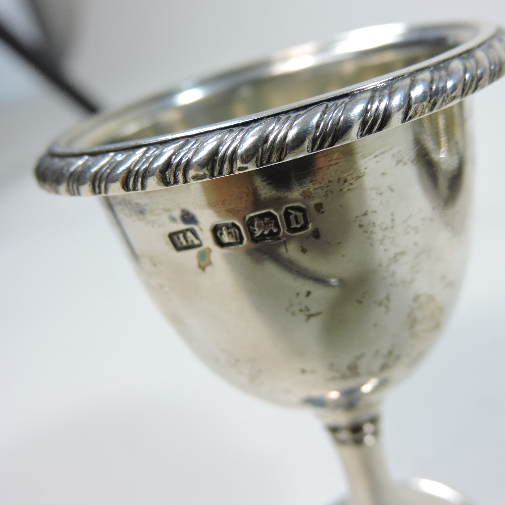 A Victorian silver egg cruet, of circular shape, fitted with four egg cups and four silver spoons, - Image 2 of 11