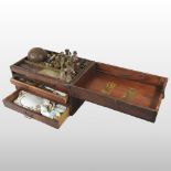 A 19th century wooden artist's box, containing glass jars of dried pigments, paints,