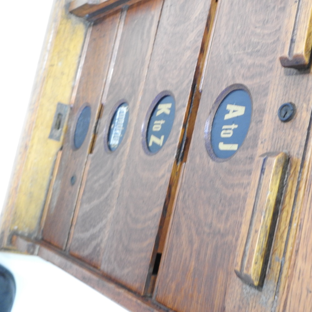 An early 20th century light oak filing cabinet, - Image 8 of 8