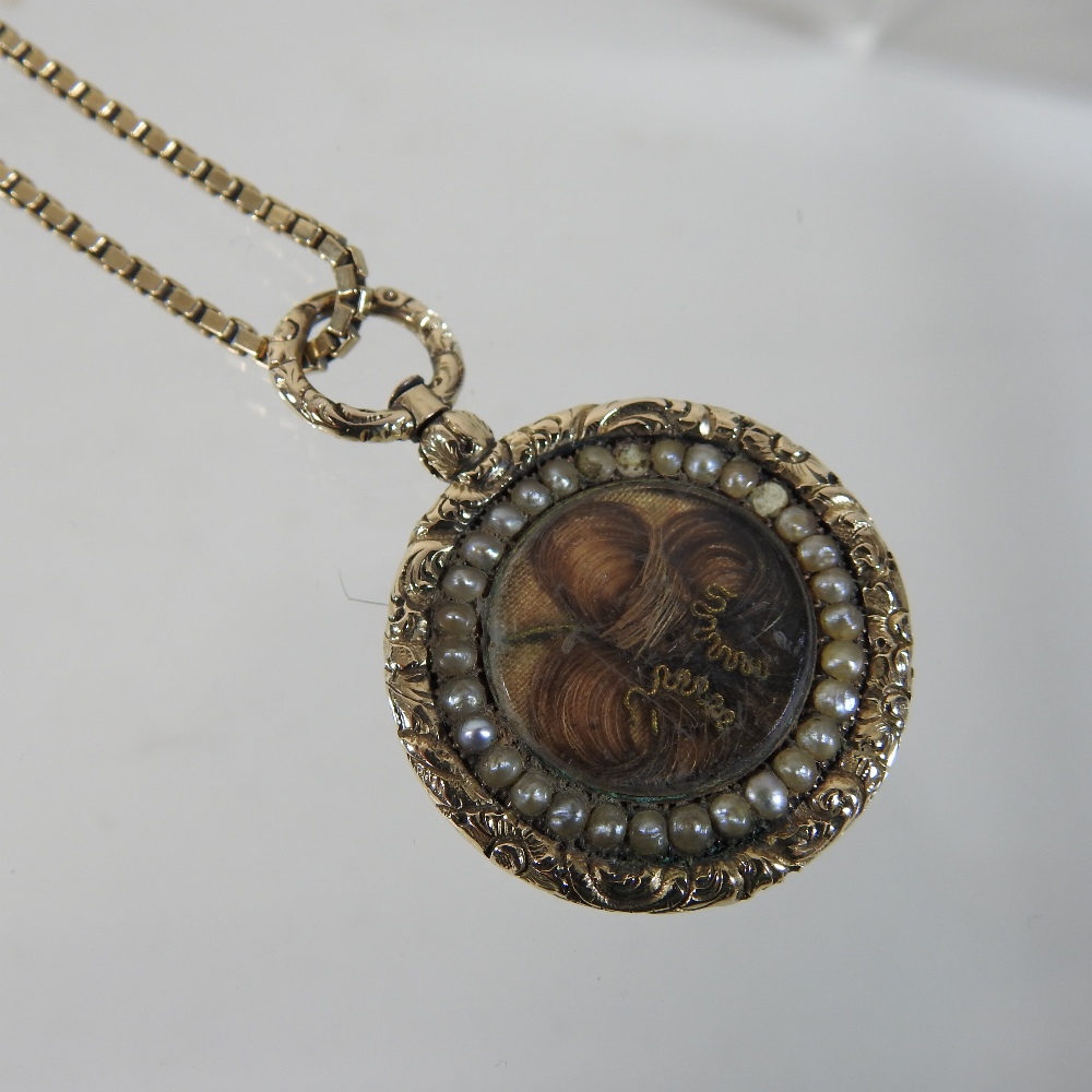 A 19th century unmarked memorial necklace, suspended with a woven hair pendant, - Image 3 of 9