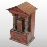 A rare Victorian mahogany cased one penny electric shock arcade machine, of architectural form,
