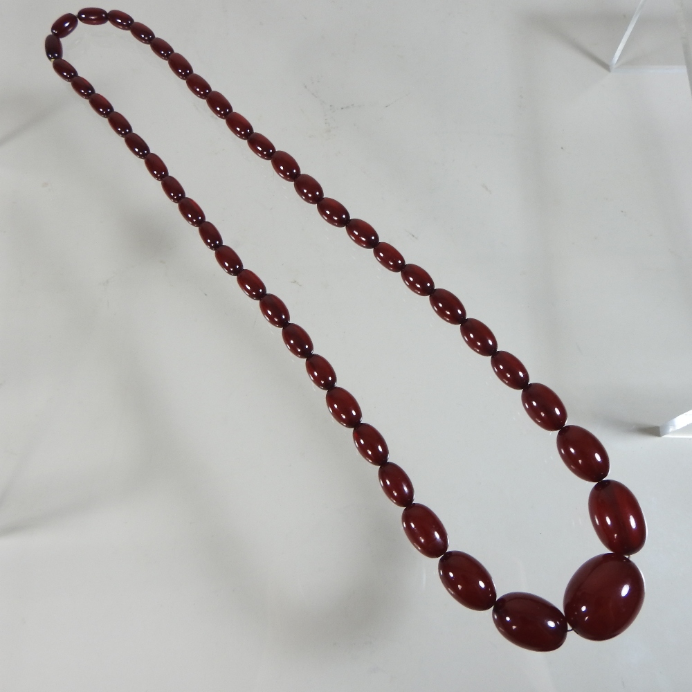 A cherry amber bead necklace, - Image 3 of 8