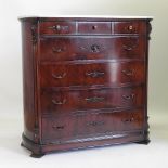 A continental mahogany marble top secretaire chest, with a fitted interior,