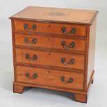 A George III style satinwood marquetry bachelor's chest, containing four long graduated drawers,