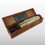 A mid 20th century Stanley Fuller spiral slide rule, in a fitted wooden case,