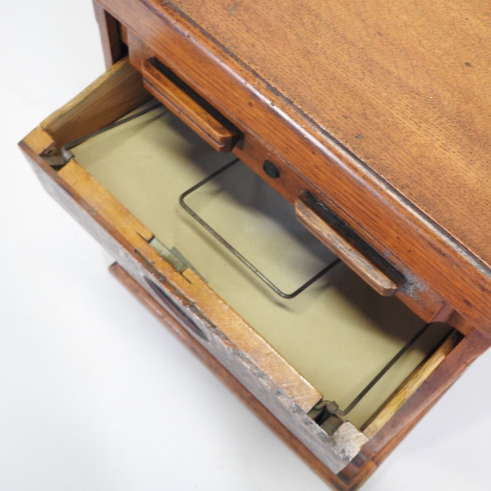 An early 20th century light oak filing cabinet, - Image 2 of 8