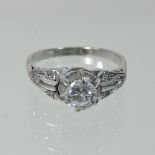 An 18 carat gold and platinum set diamond ring, approx 0.