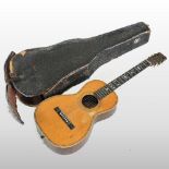 An early 20th century American Harwood acoustic guitar,