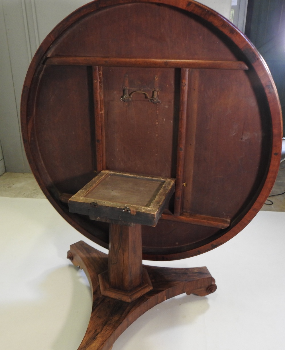 A George III rosewood and inlaid breakfast table, with a hinged circular top, - Image 2 of 9