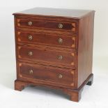 A George III style mahogany bachelor's chest, with satinwood banding,